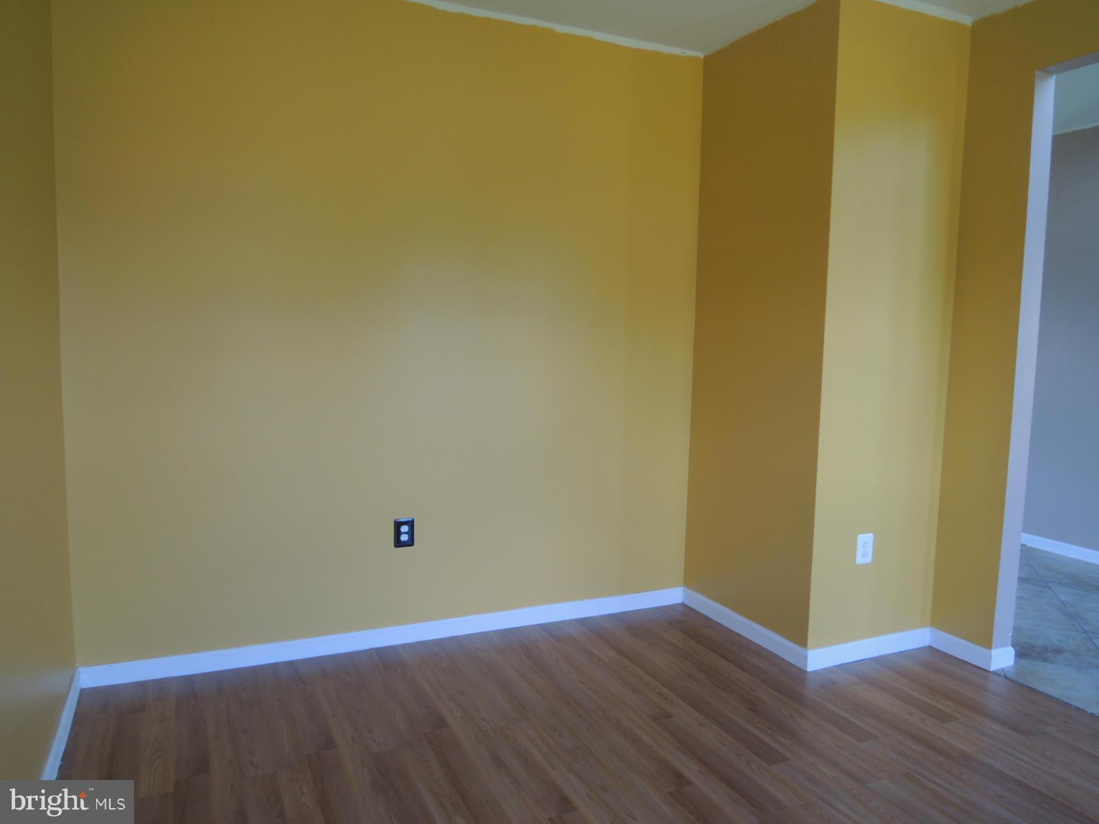 45 Boise Road Inwood, WV 25428 - Photo 9 of 30 a view of an empty room with wooden floor