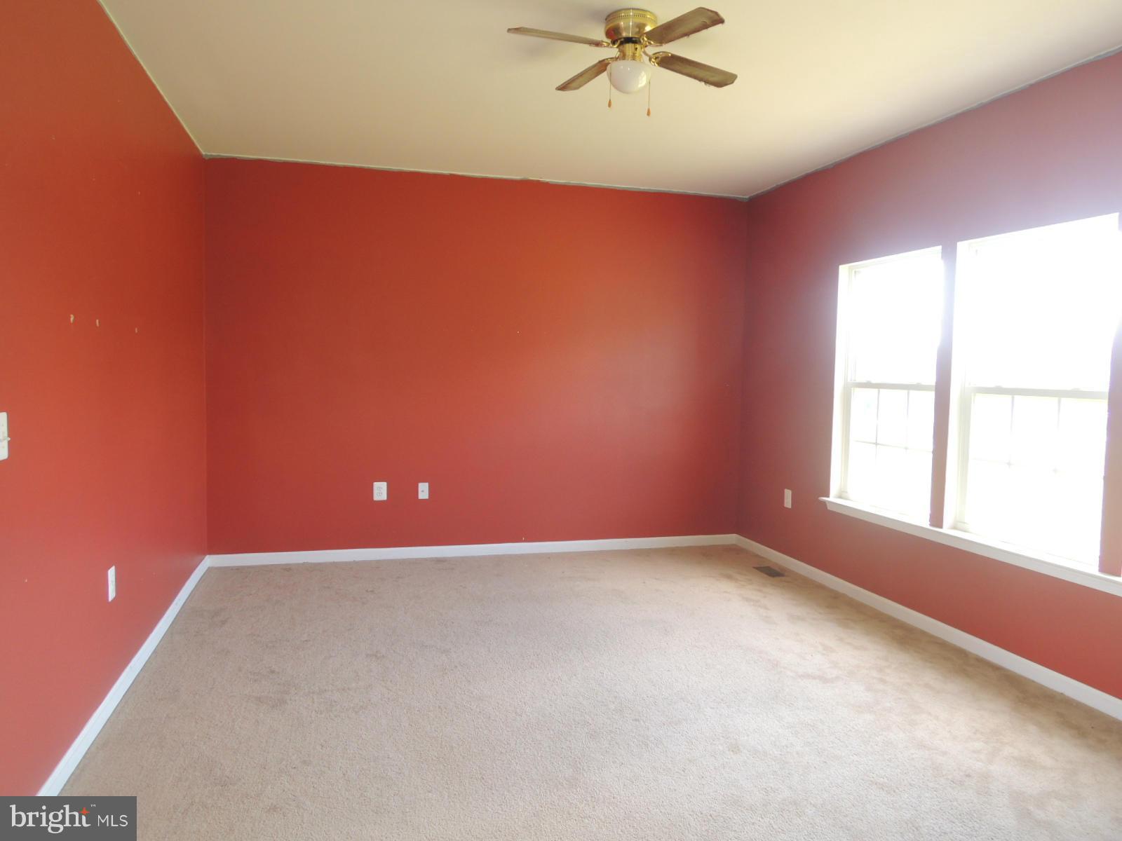 45 Boise Road Inwood, WV 25428 - Photo 10 of 30 an empty room with a window
