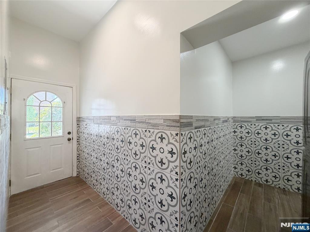 26 River Edge Road River Edge, NJ 07661 - Photo 3 of 10 wooden floor in an empty room