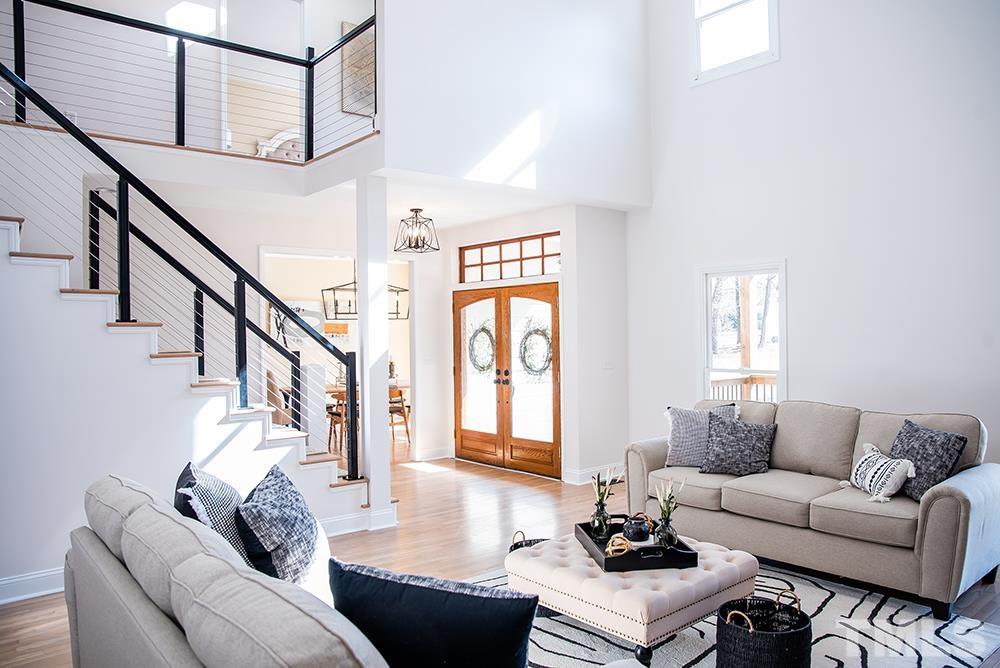 433 Noah Davis Road Roxboro, NC 27574 - Photo 11 of 95 a living room with furniture and a window