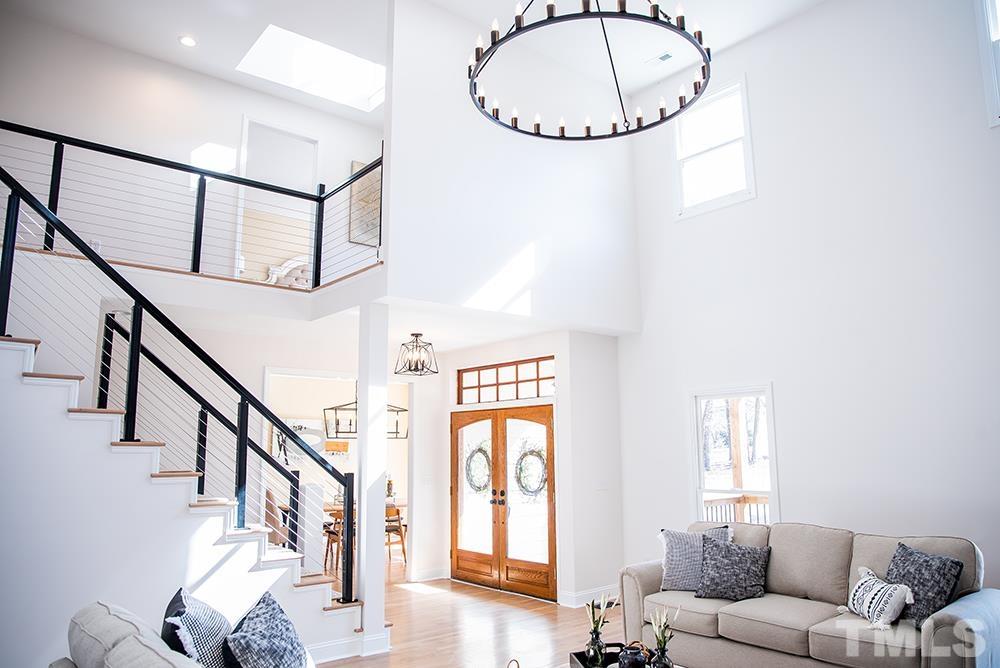 433 Noah Davis Road Roxboro, NC 27574 - Photo 12 of 95 a view of entryway and hall with wooden floor
