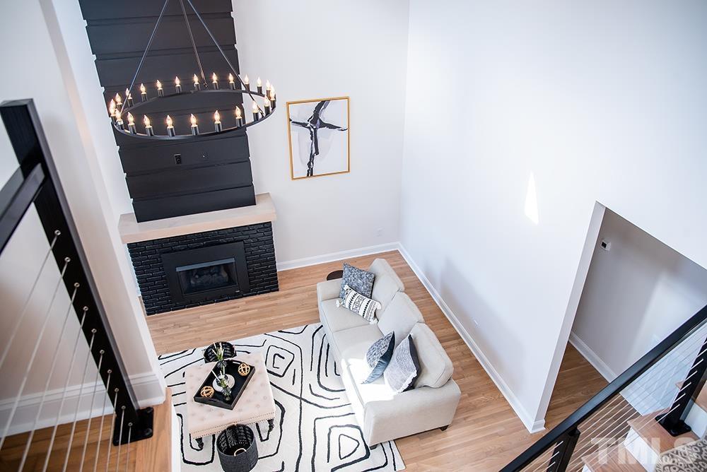 433 Noah Davis Road Roxboro, NC 27574 - Photo 50 of 95 a view of living room with furniture and a fireplace