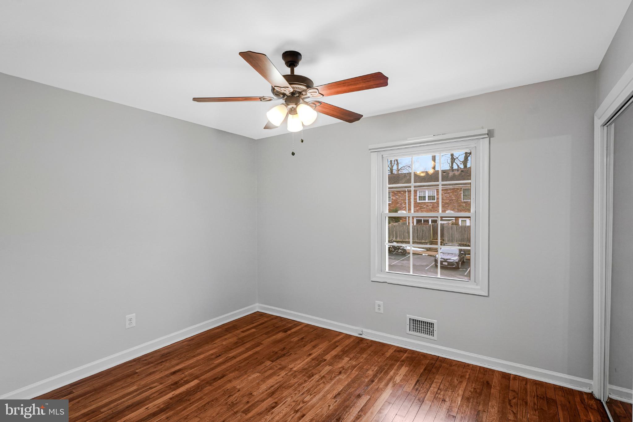 8330 Darlington Court, Unit 467 Springfield, VA 22152 - Photo 18 of 23 Bright and airy room with hardwood floors.