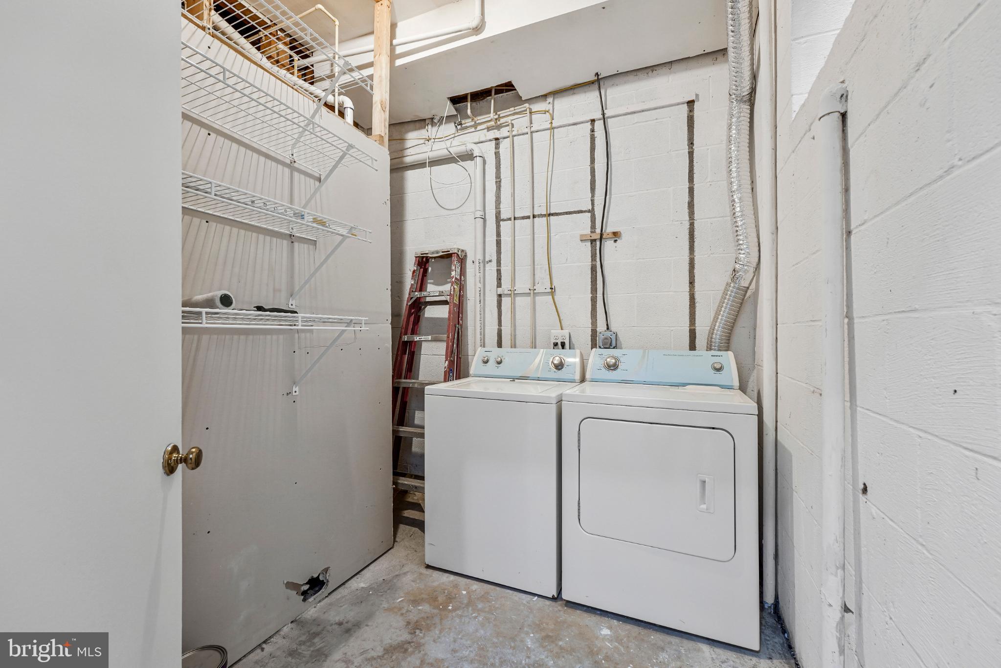 8330 Darlington Court, Unit 467 Springfield, VA 22152 - Photo 20 of 23 Functional laundry space with ample storage.