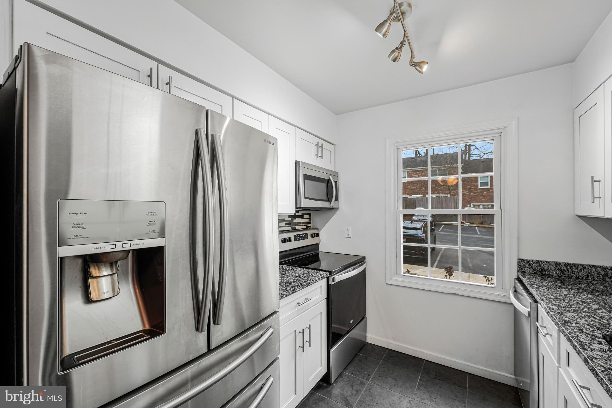 8330 Darlington Court, Unit 467 Springfield, VA 22152 - Photo 8 of 23 Modern kitchen with sleek appliances.