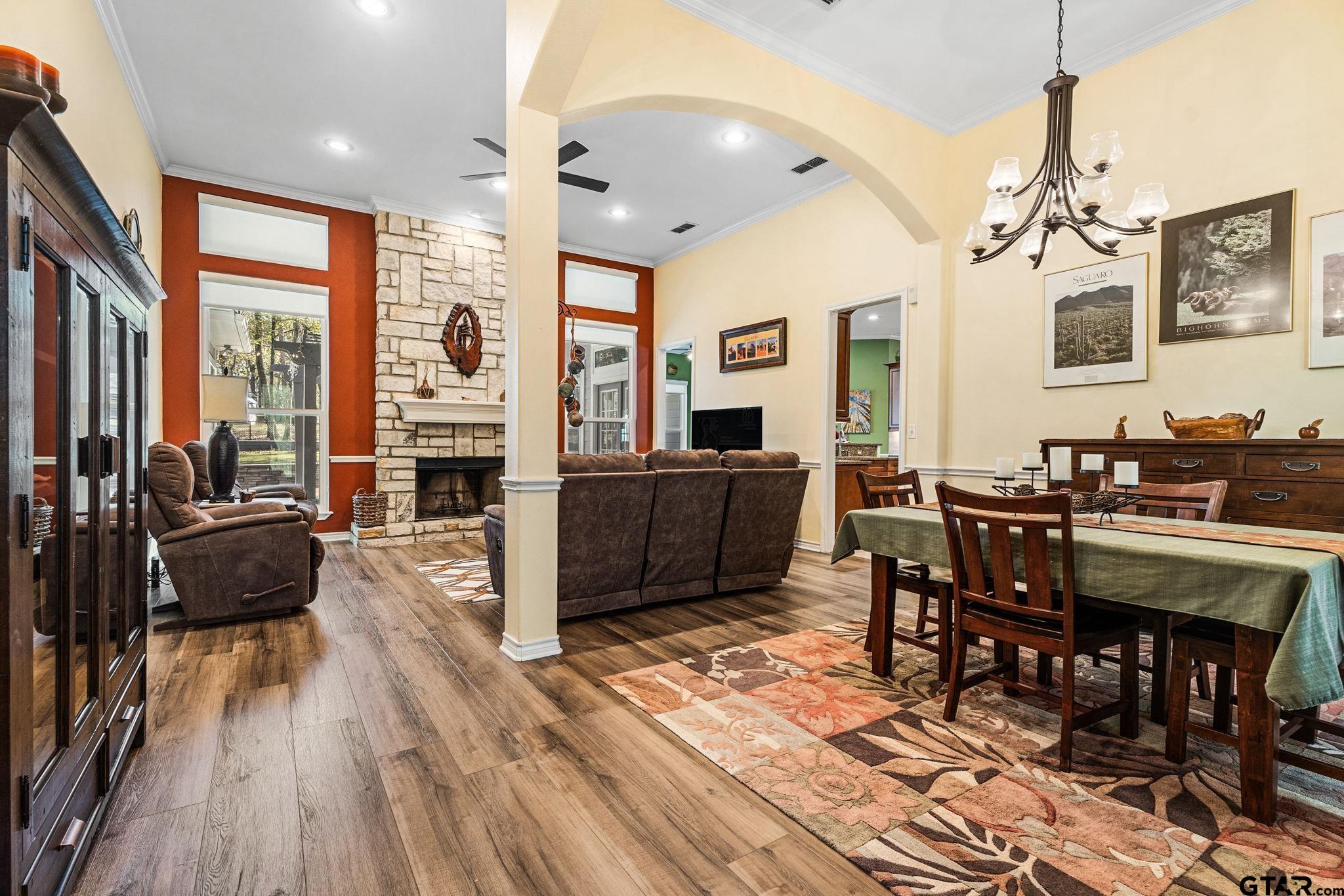 14417 East Ridge Road Arp, TX 75750 - Photo 6 of 47 a living room with furniture a large window and wooden floor