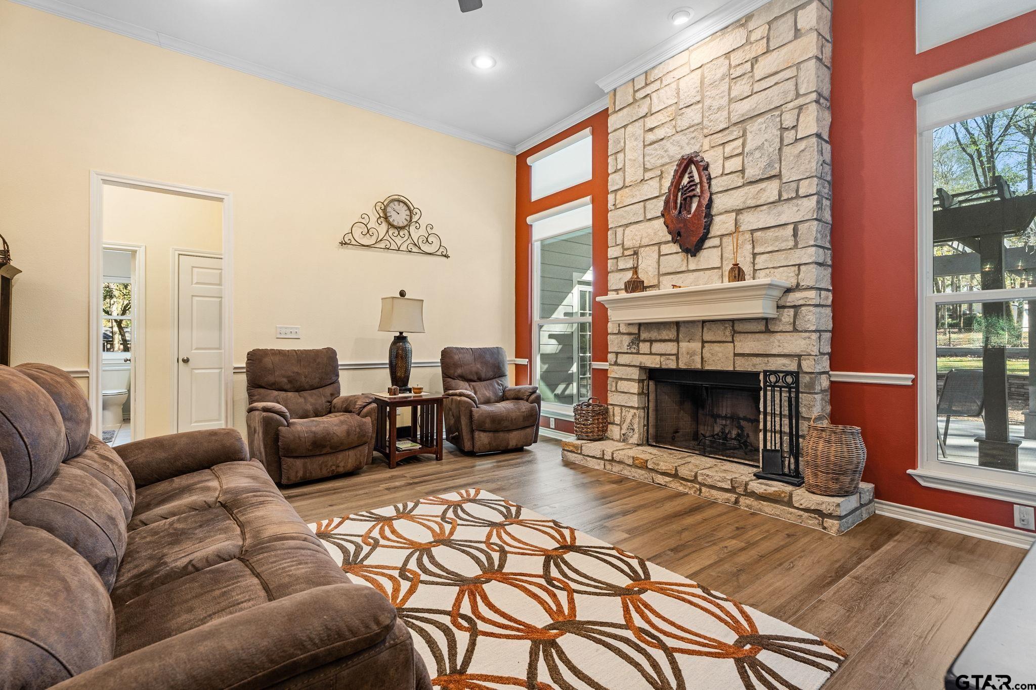 14417 East Ridge Road Arp, TX 75750 - Photo 8 of 47 a living room with furniture a large window and a fireplace
