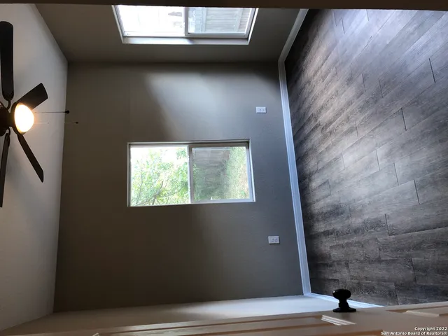 an empty room with windows
