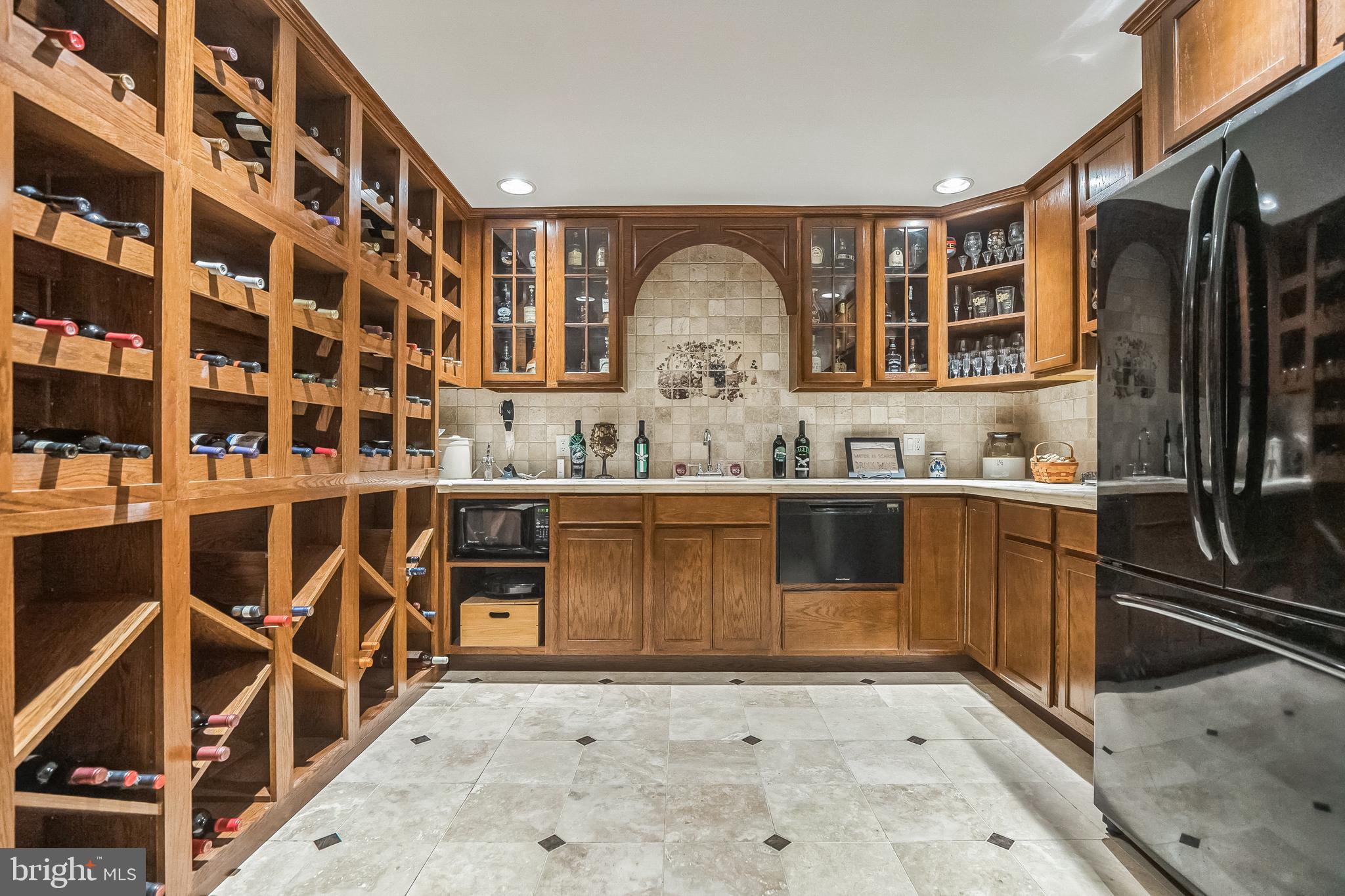 241 Bells Lake Road Turnersville, NJ 08012 - Photo 28 of 33 Custom Bar Area with Wine Racks and Appliances