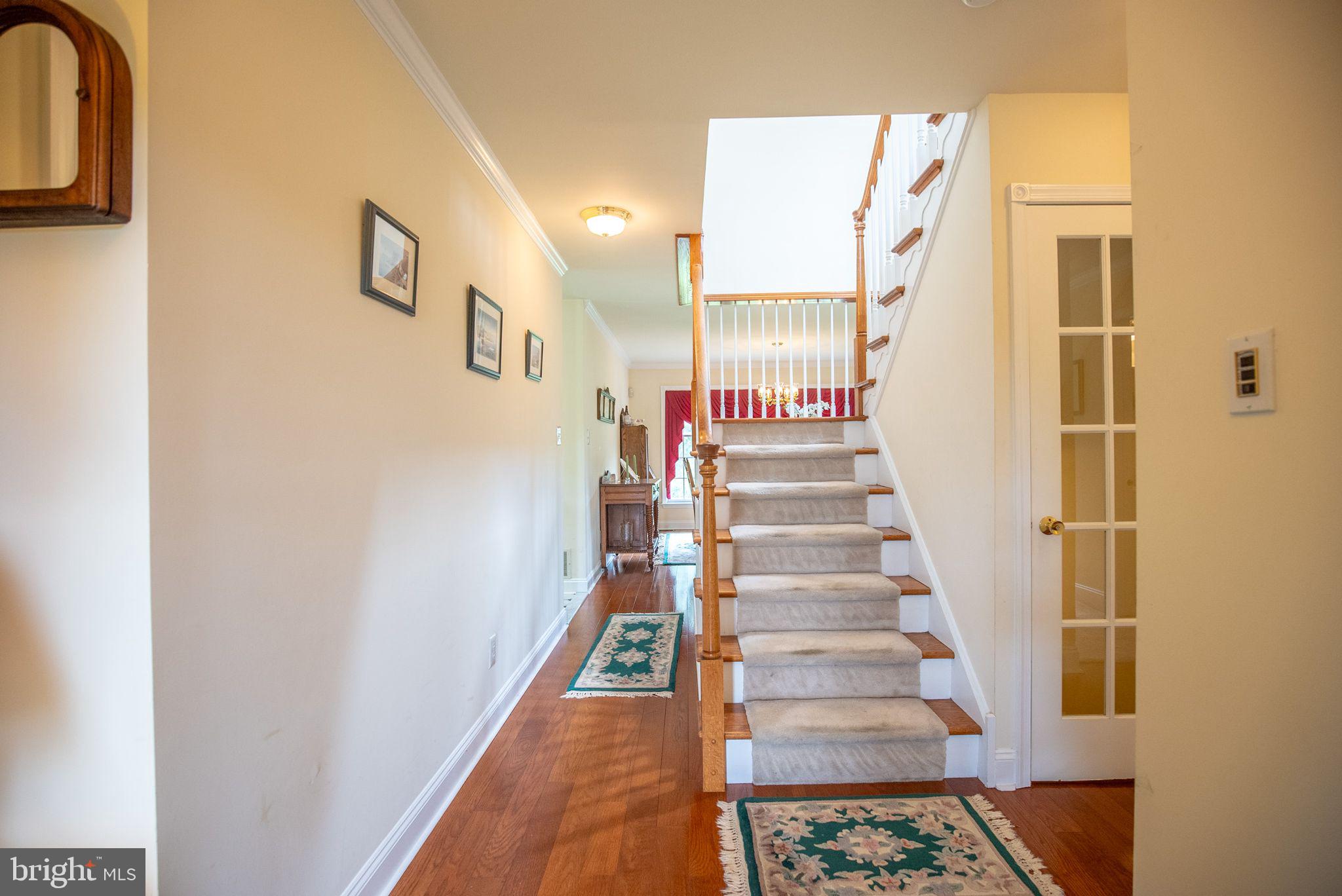 241 Bells Lake Road Turnersville, NJ 08012 - Photo 3 of 33 Entrance Foyer Featuring a Split Staircase