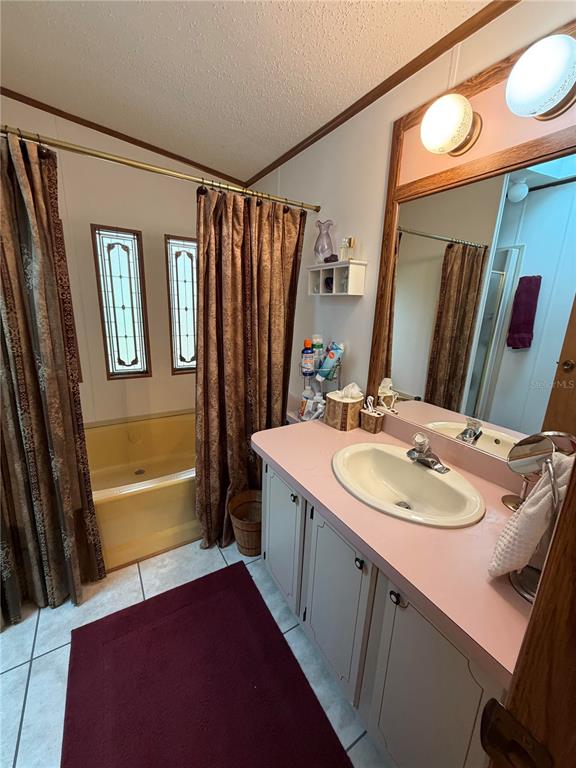 17 Meadowlark Circle Ellenton, FL 34222 - Photo 11 of 25 a bathroom with a sink and a mirror