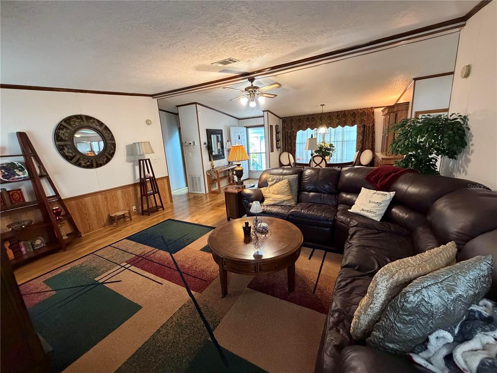 17 Meadowlark Circle Ellenton, FL 34222 - Photo 14 of 25 a living room with furniture and a large window