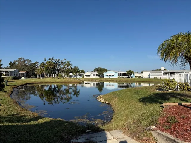 a view of a lake with houses