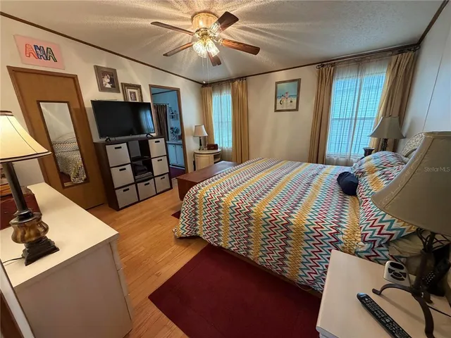 a bedroom with a bed and furniture
