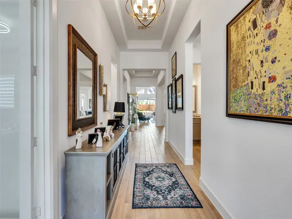 a view of living room with furniture and a rug