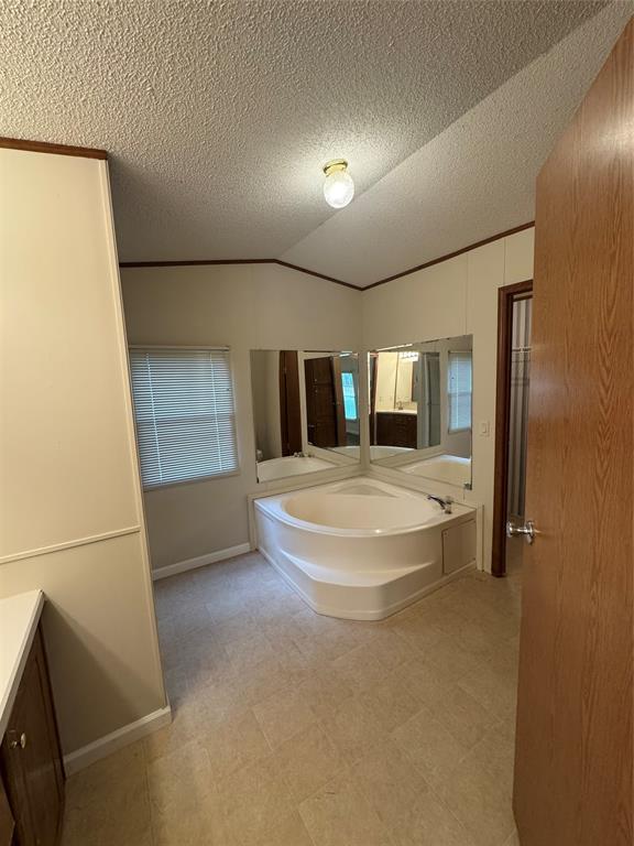 243 Springs Road Frierson, LA 71027 - Photo 11 of 23 a view of a big room with closet and windows