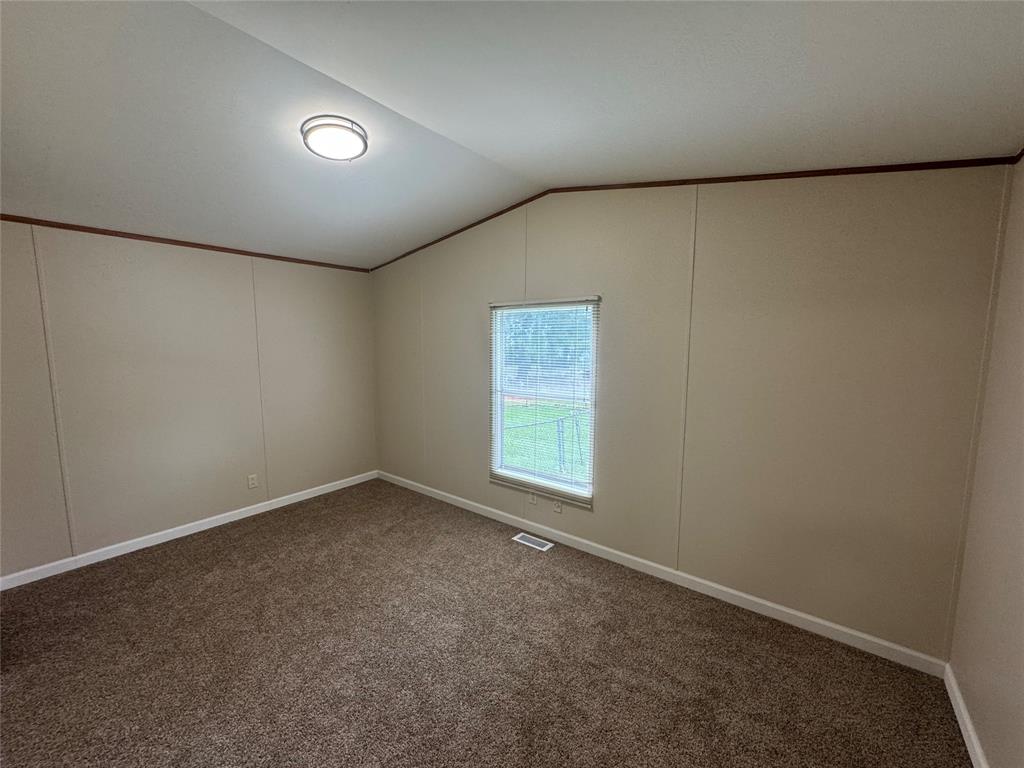 243 Springs Road Frierson, LA 71027 - Photo 17 of 23 an empty room with a window