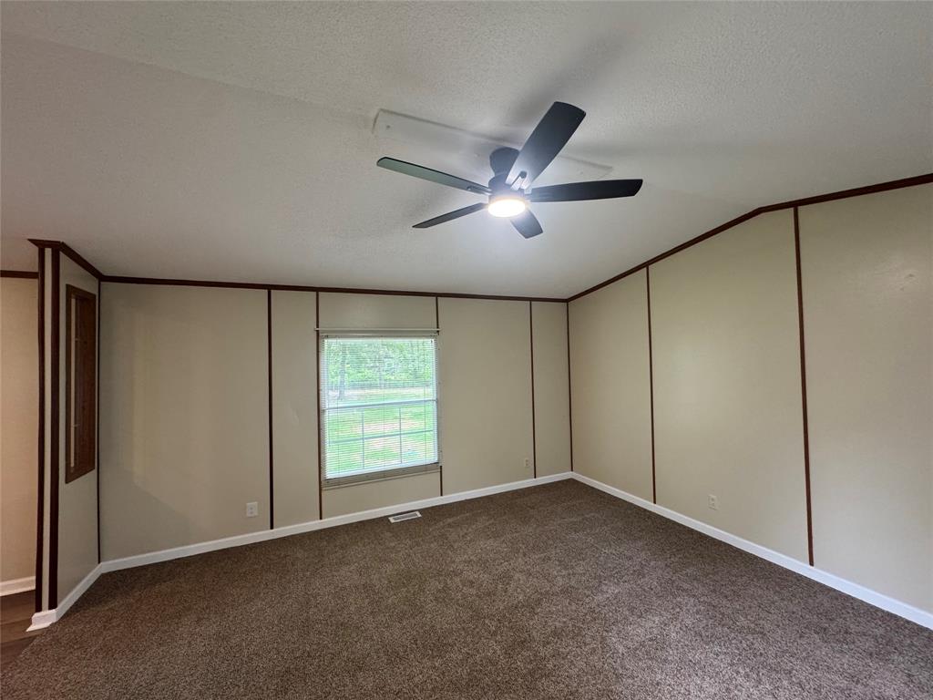 243 Springs Road Frierson, LA 71027 - Photo 3 of 23 a view of an empty room with a window