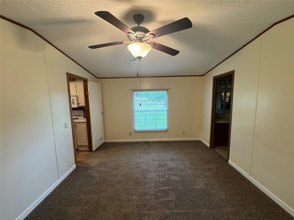 243 Springs Road Frierson, LA 71027 - Photo 10 of 23 an empty room with closet and windows