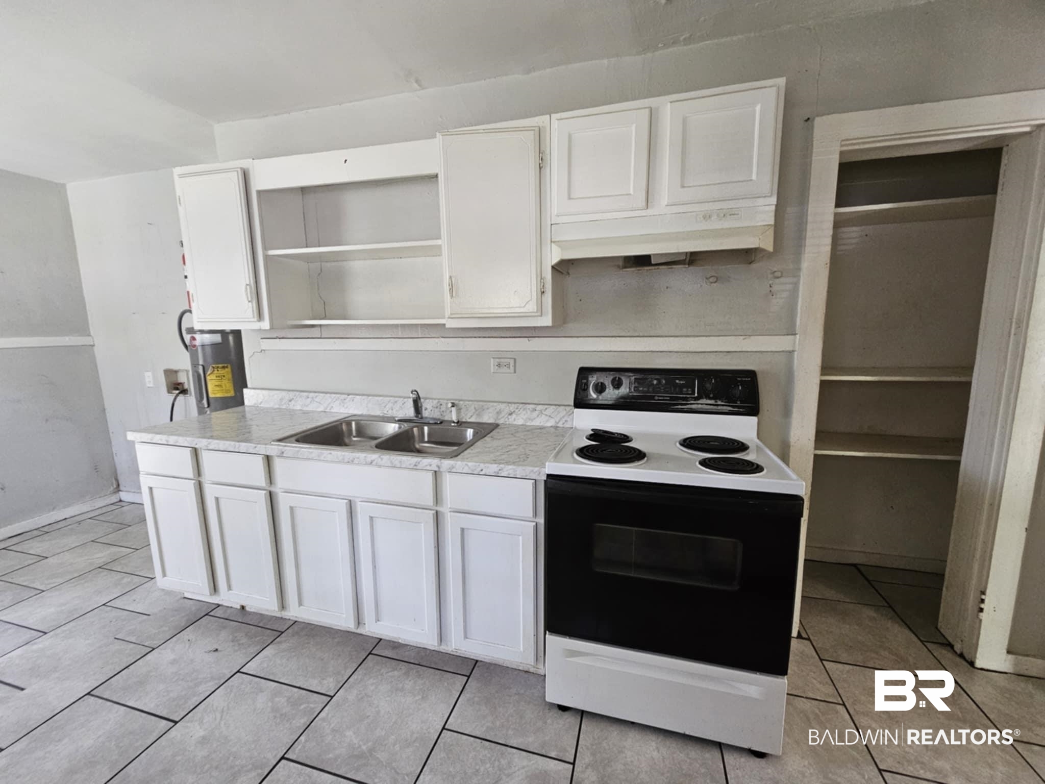 2253 Barlow Street Mobile, AL 36617 - Photo 2 of 10 Kitchen featuring a sink, open shelves, white cabinetry, and electric stove