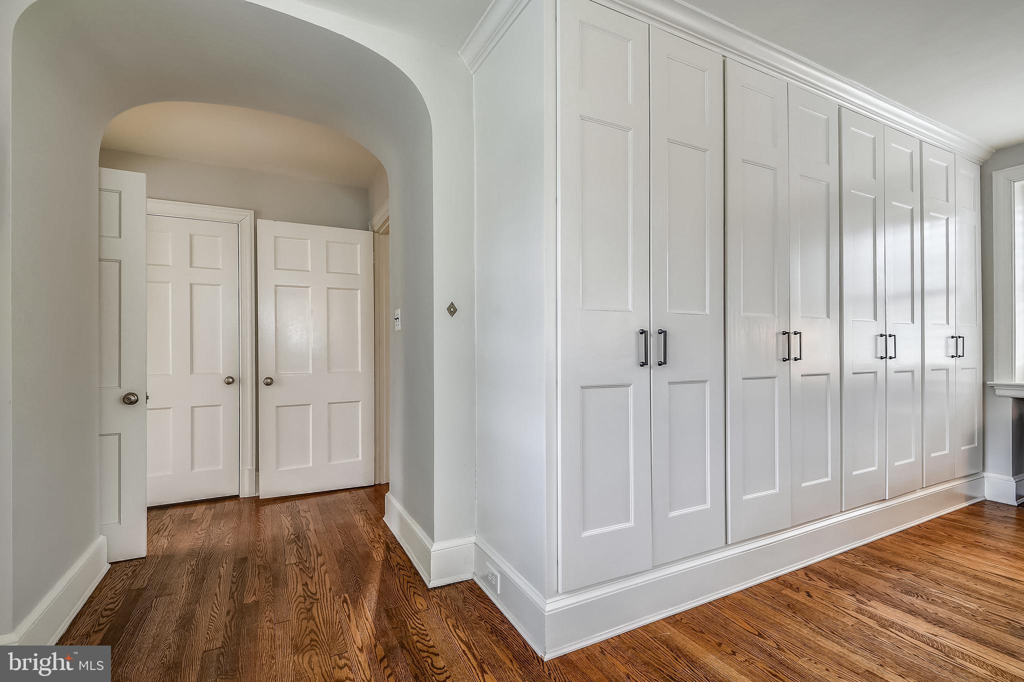105 Tunbridge Road Baltimore, MD 21212 - Photo 28 of 62 a view of a hallway with wooden floor and closet area