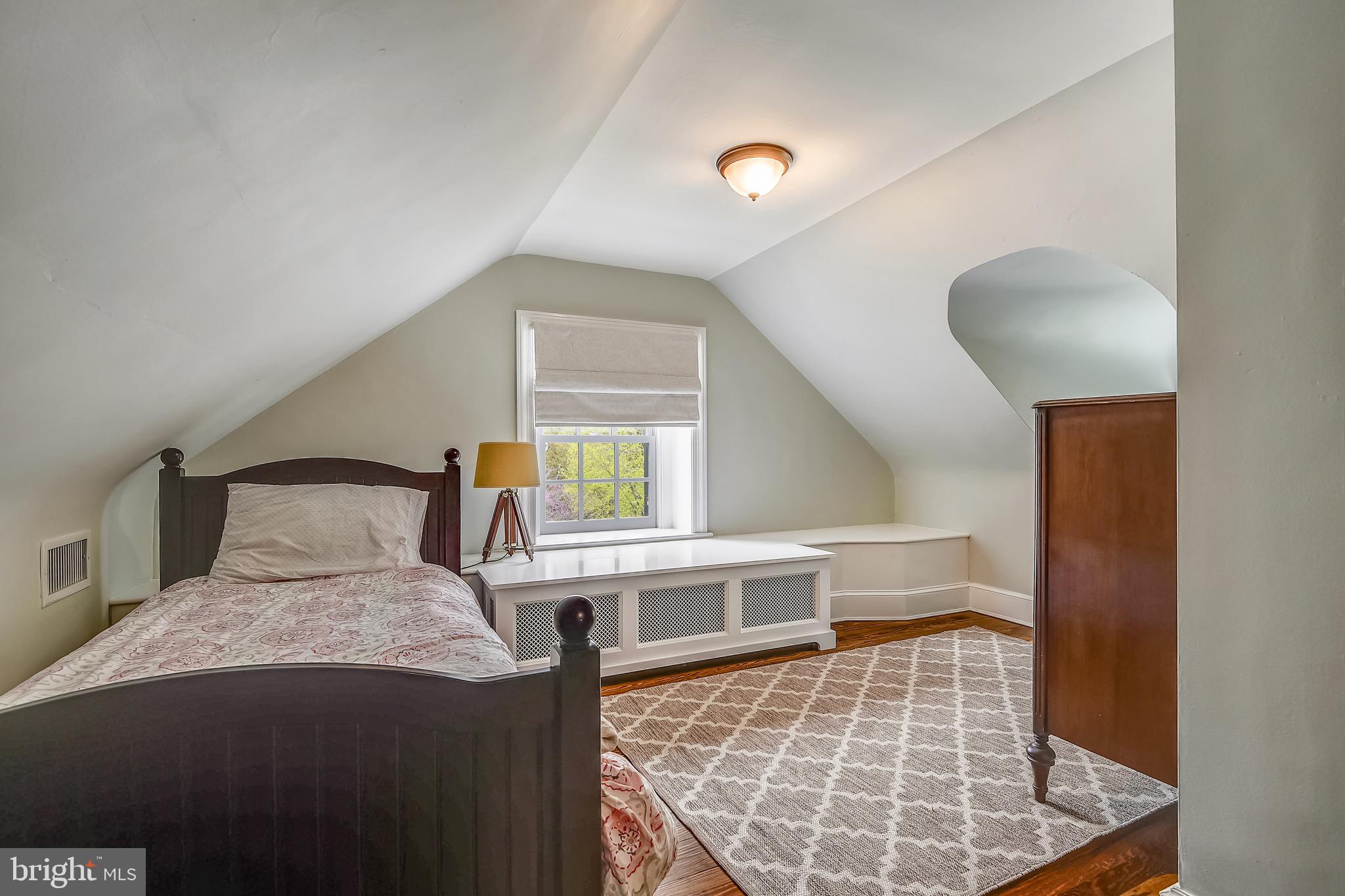 105 Tunbridge Road Baltimore, MD 21212 - Photo 39 of 62 a bedroom with a bed and a window