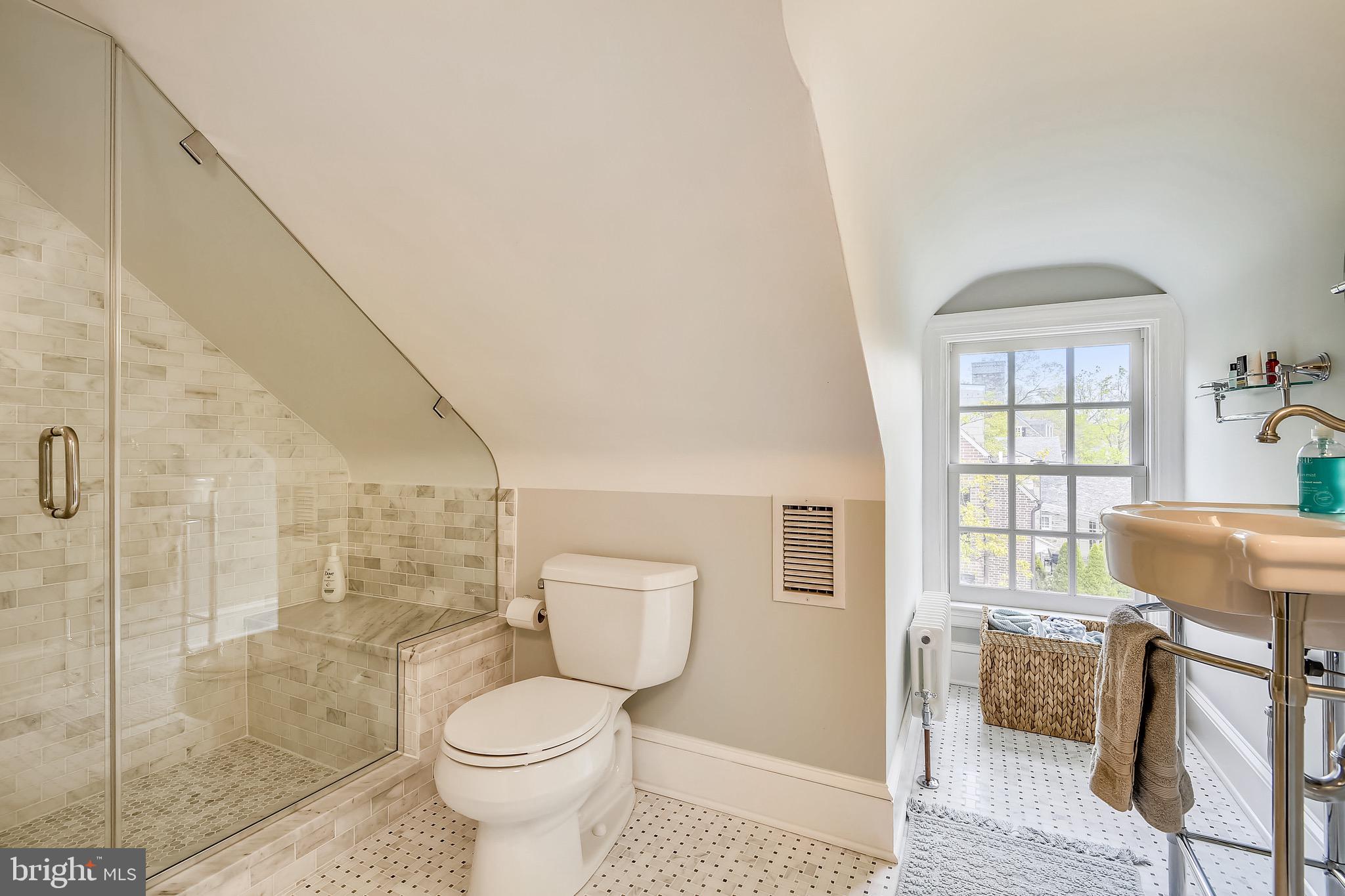 105 Tunbridge Road Baltimore, MD 21212 - Photo 40 of 62 a bathroom with a toilet and a shower