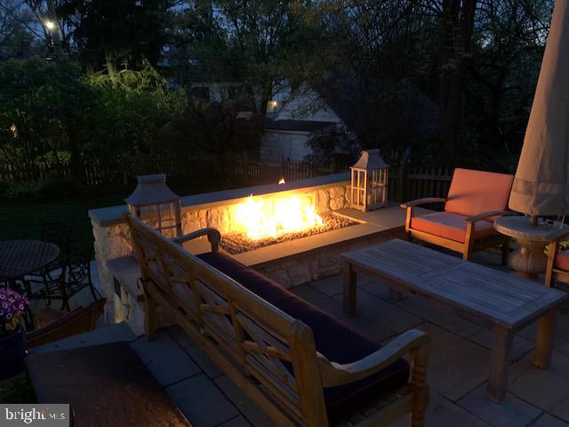 105 Tunbridge Road Baltimore, MD 21212 - Photo 49 of 62 Spend chilly nights by the fire with friends