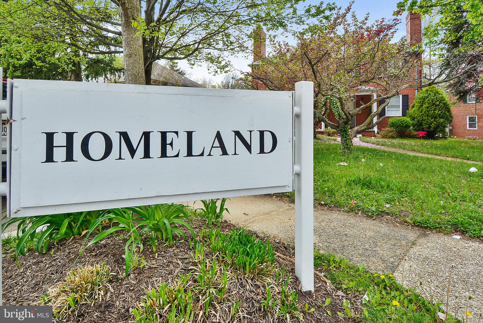 105 Tunbridge Road Baltimore, MD 21212 - Photo 58 of 62 a sign broad on the side of the road