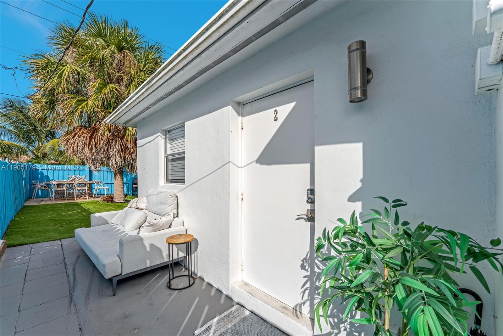 1105 Northeast 10th Street Hallandale Beach, FL 33009 - Photo 13 of 28 a view of a couches in backyard of house