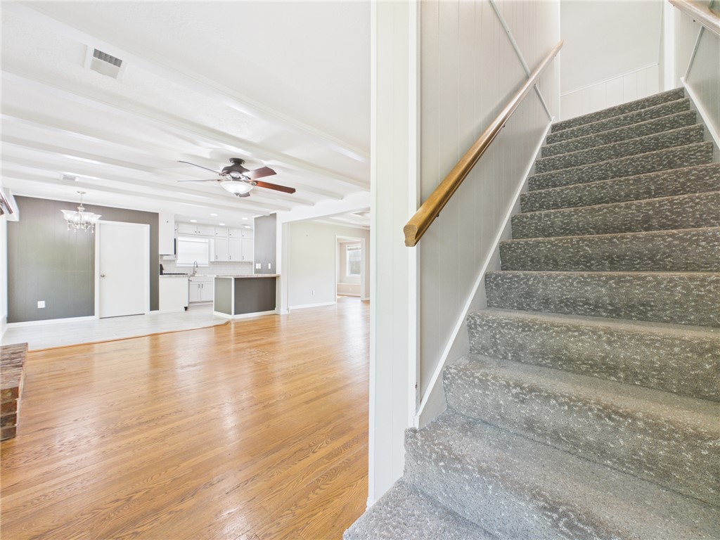 902 Briar Bend Court Bryan, TX 77802 - Photo 13 of 39 a view of an entryway with wooden floor