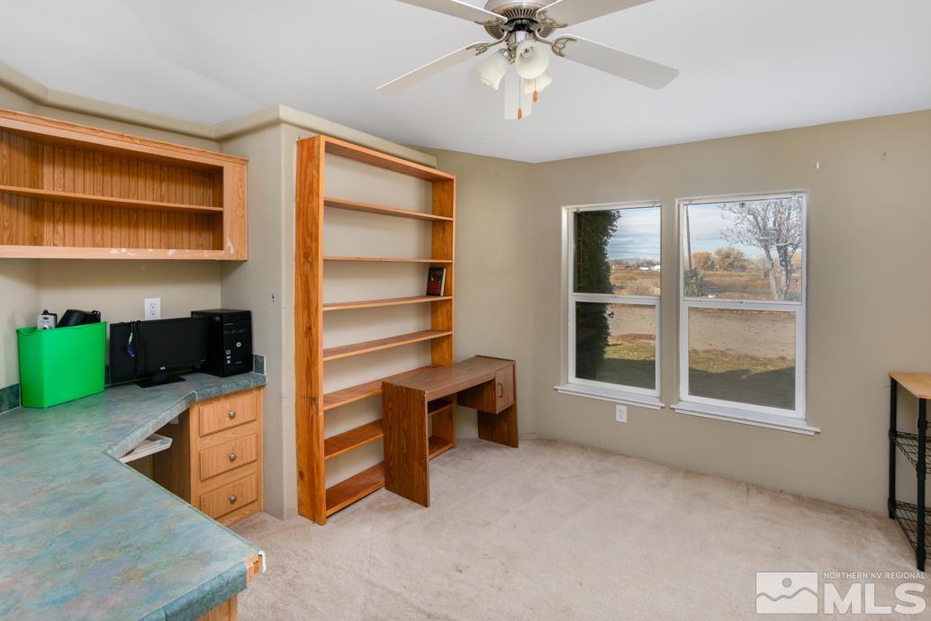 5605 Alcorn Road Fallon, NV 89406 - Photo 16 of 35 a view of an empty room with a window