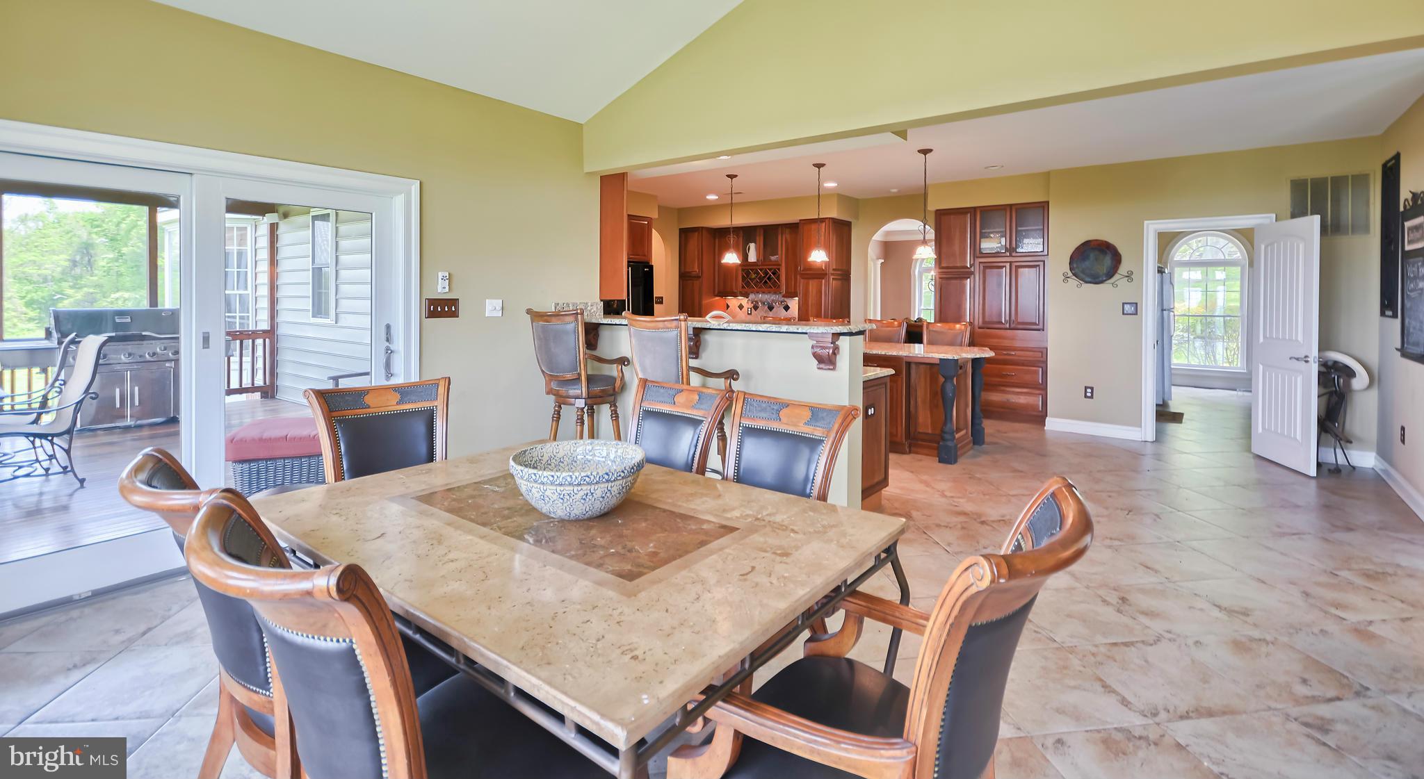 4522 Coxey Brown Road Myersville, MD 21773 - Photo 15 of 30 a view of a dining room with furniture and wooden floor