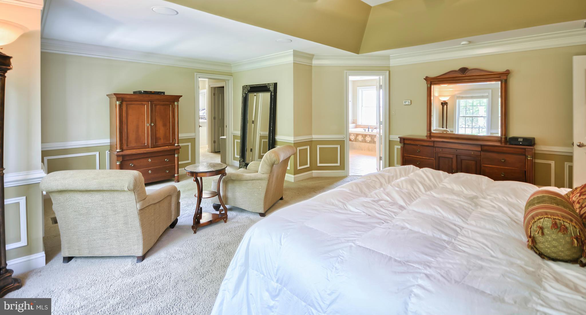 4522 Coxey Brown Road Myersville, MD 21773 - Photo 19 of 30 a bedroom with a bed couch and windows
