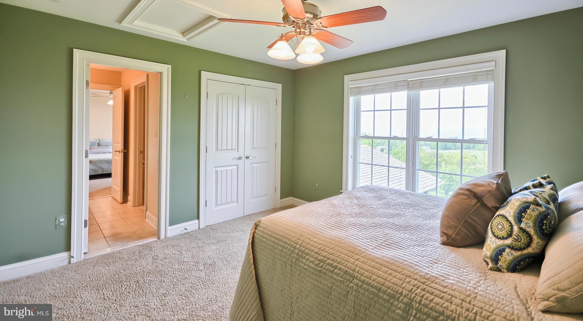 4522 Coxey Brown Road Myersville, MD 21773 - Photo 22 of 30 a bedroom with a bed and a window