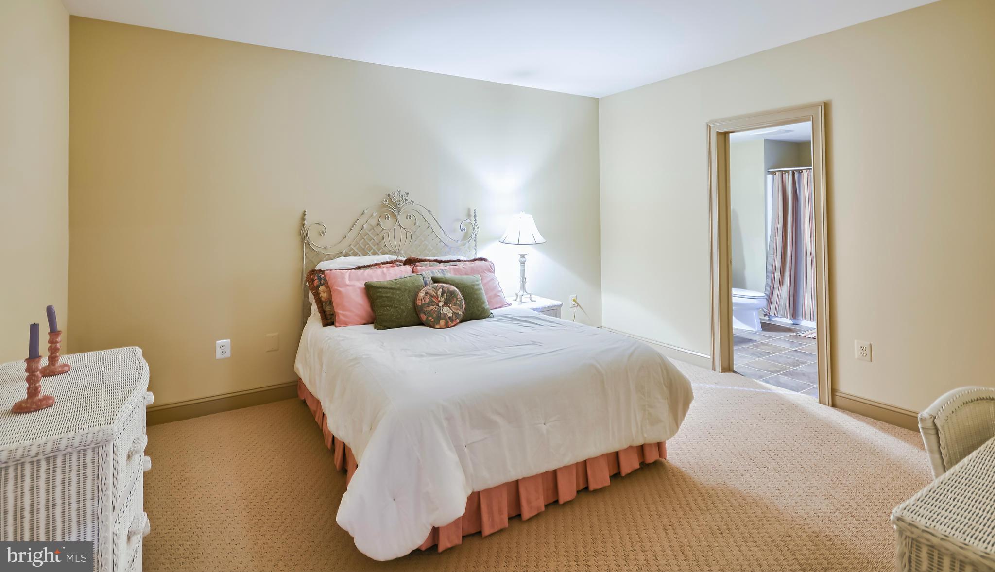 4522 Coxey Brown Road Myersville, MD 21773 - Photo 27 of 30 a bedroom with a bed and a couch