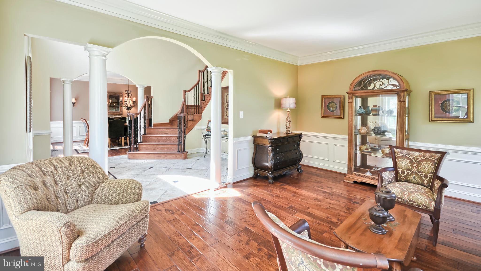 4522 Coxey Brown Road Myersville, MD 21773 - Photo 8 of 30 a living room with furniture a wooden floor and a large window