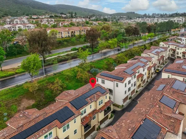 an aerial view of a house with a garden