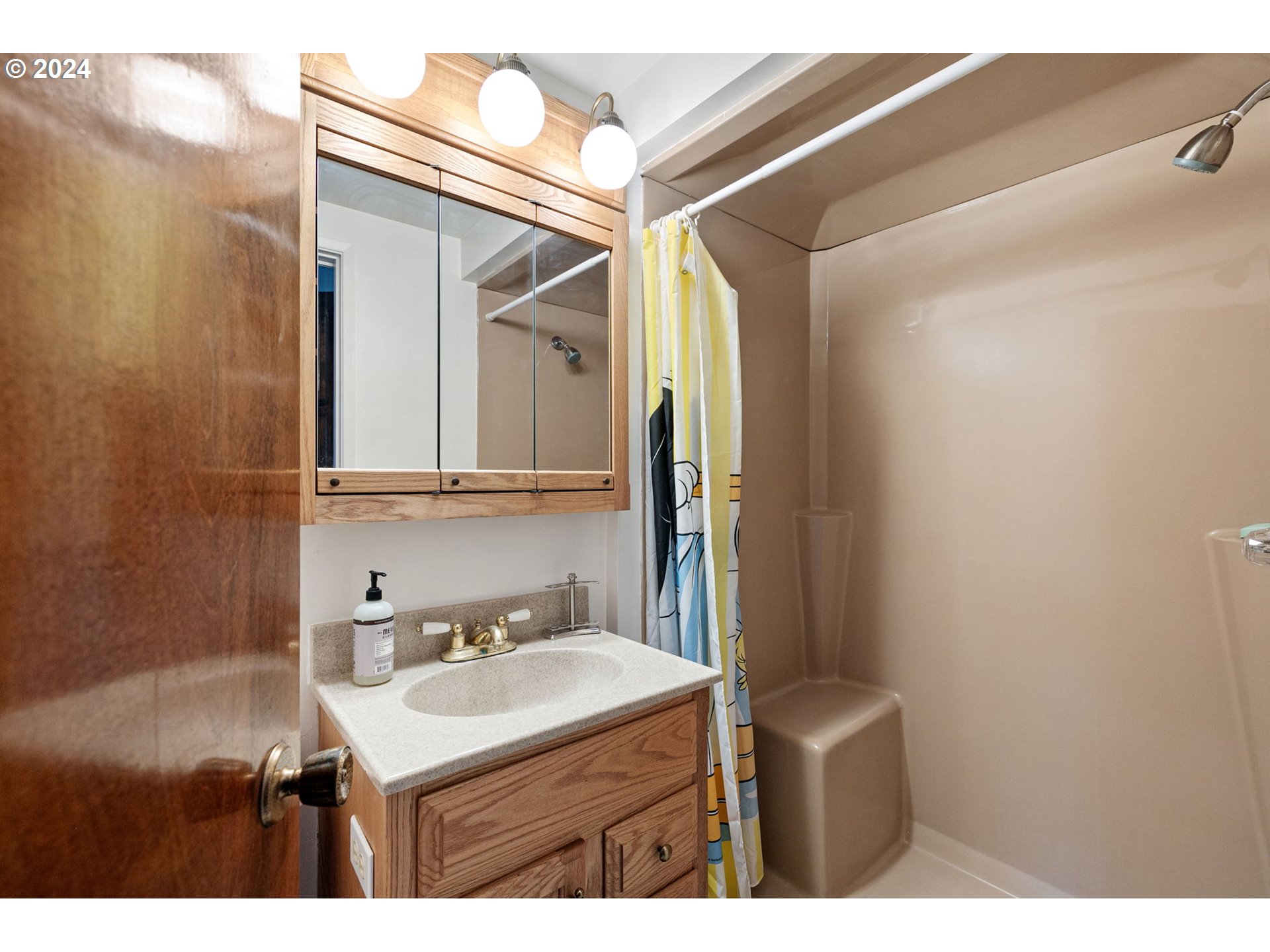 37797 Worth Road Springfield, OR 97478 - Photo 14 of 47 a bathroom with a sink mirror and vanity