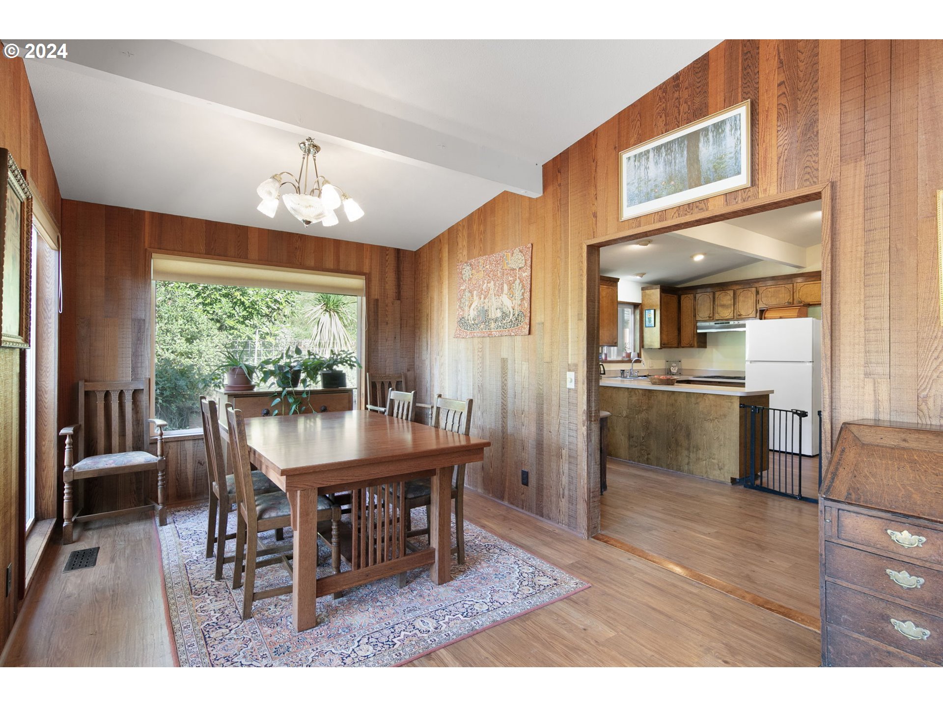 37797 Worth Road Springfield, OR 97478 - Photo 16 of 47 a view of a dining room with furniture window and wooden floor