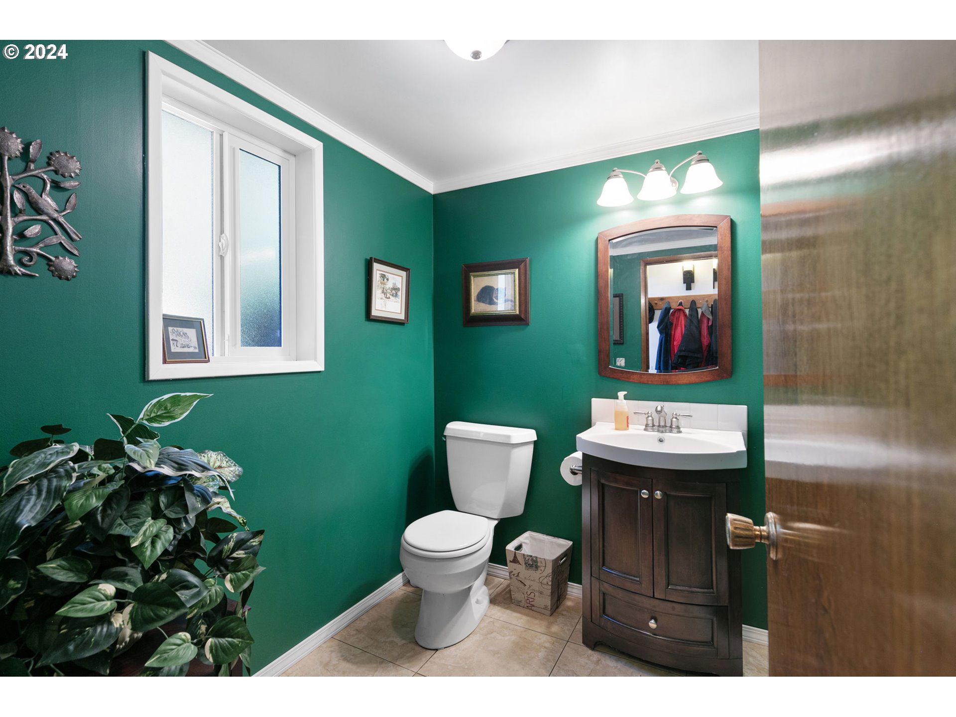 37797 Worth Road Springfield, OR 97478 - Photo 22 of 47 a bathroom with a toilet sink and mirror