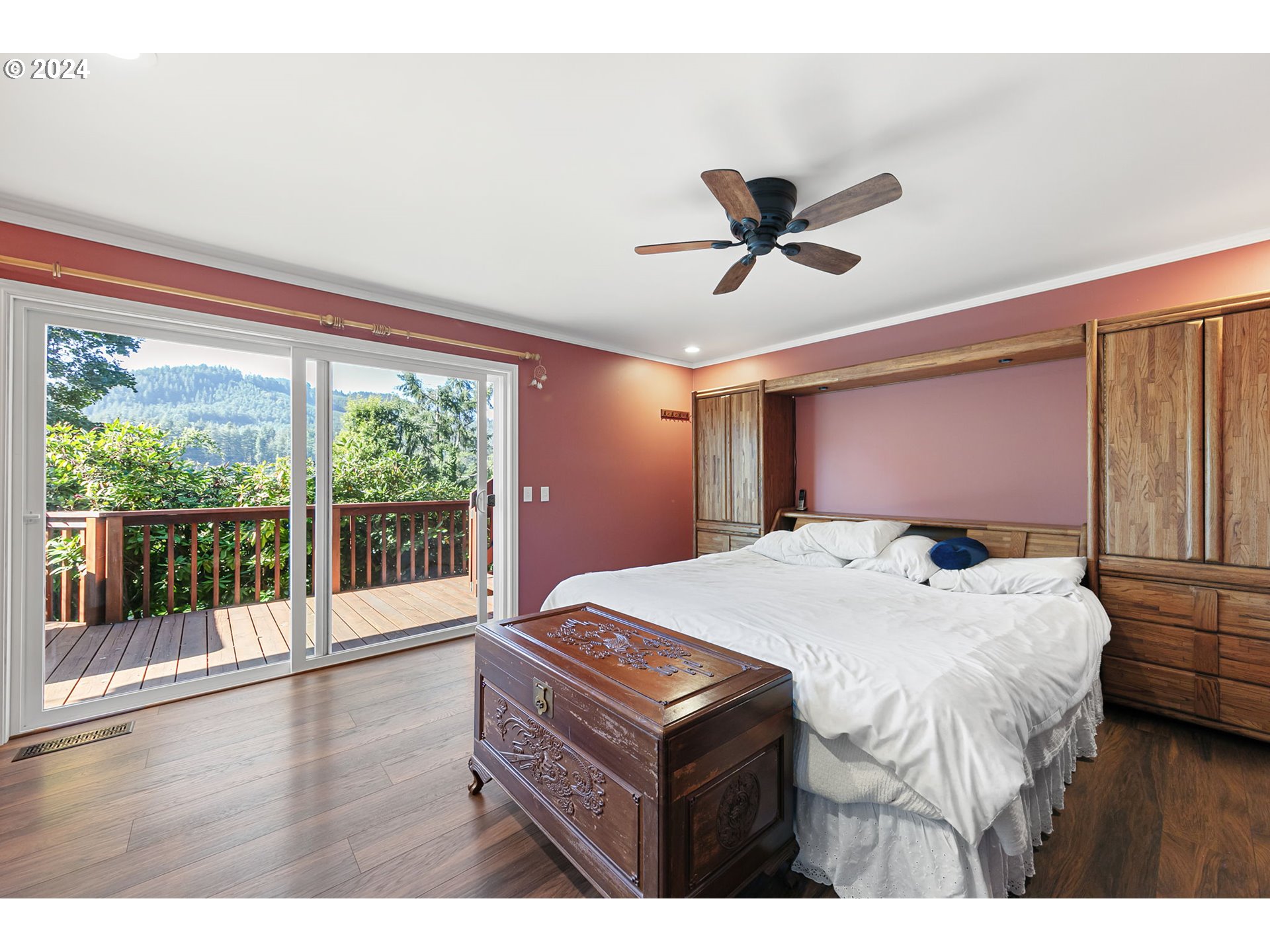 37797 Worth Road Springfield, OR 97478 - Photo 24 of 47 a bedroom with a bed and a large window