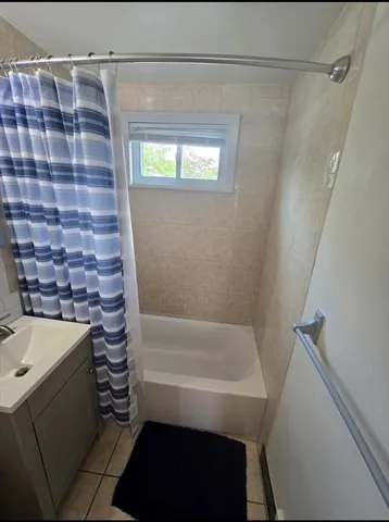 a bathroom with a sink and a bathtub
