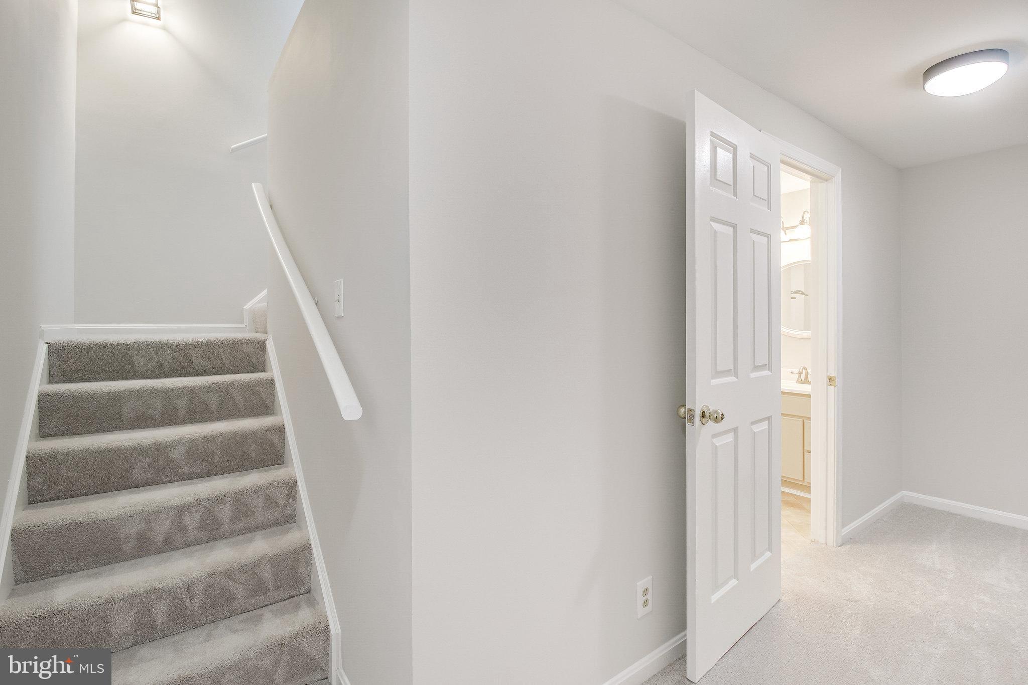 9412 Eagle Trace Fairfax Station, VA 22039 - Photo 60 of 89 Staircase to Basement