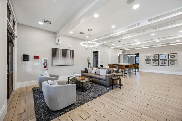 a black and white photo of a living room