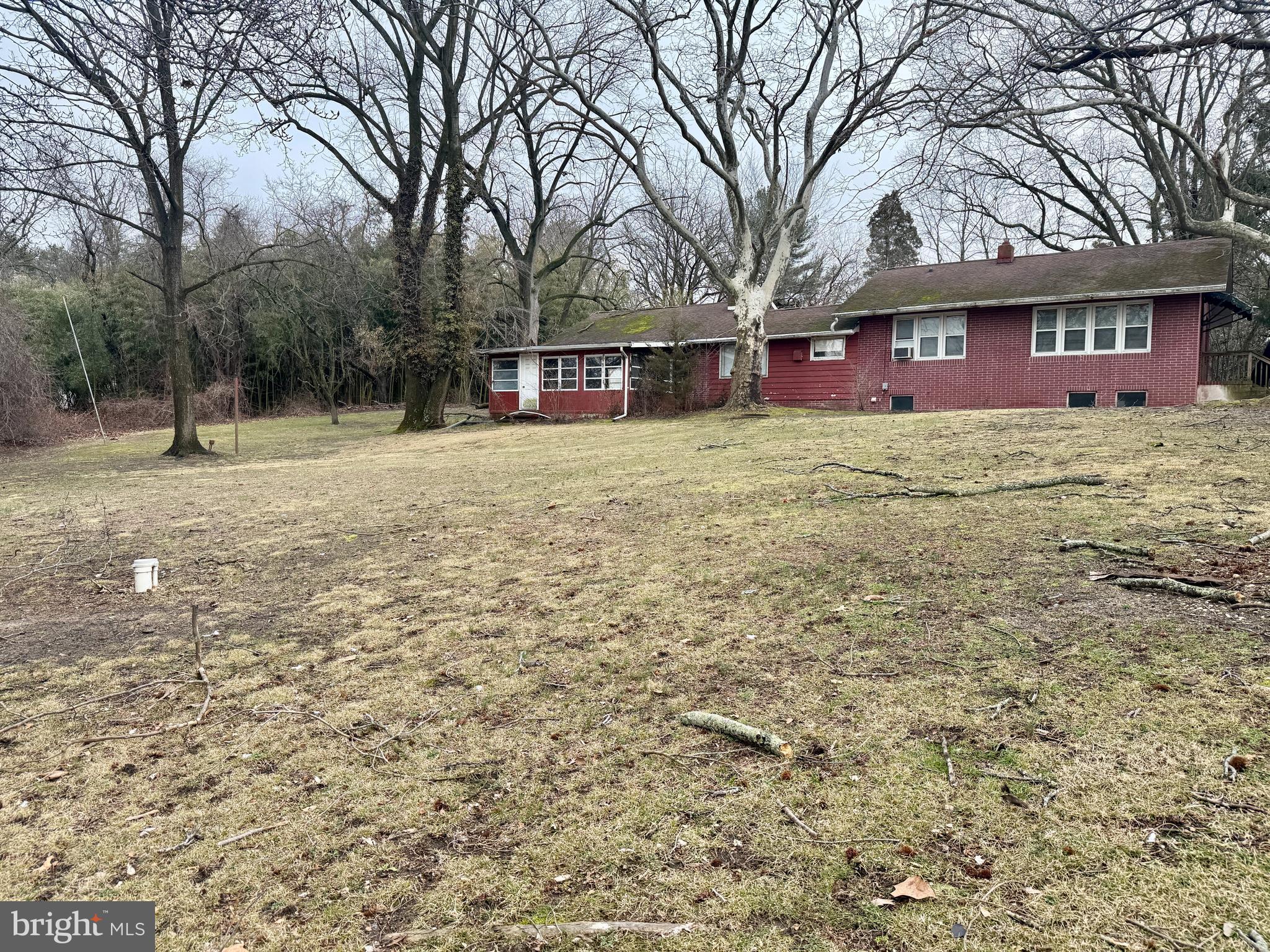 609 Hurffville - Cross Keys Road Sewell, NJ 08080 - Photo 14 of 18 a front view of a building with large trees
