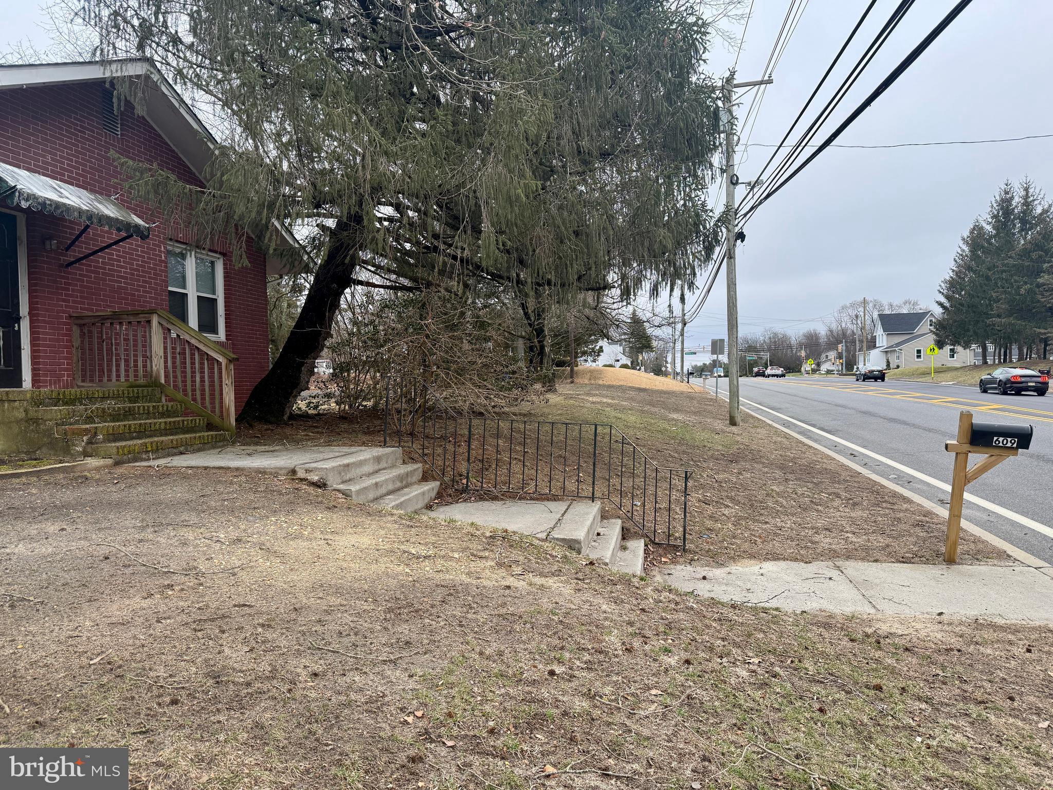 609 Hurffville - Cross Keys Road Sewell, NJ 08080 - Photo 16 of 18 a view of a yard with a tree