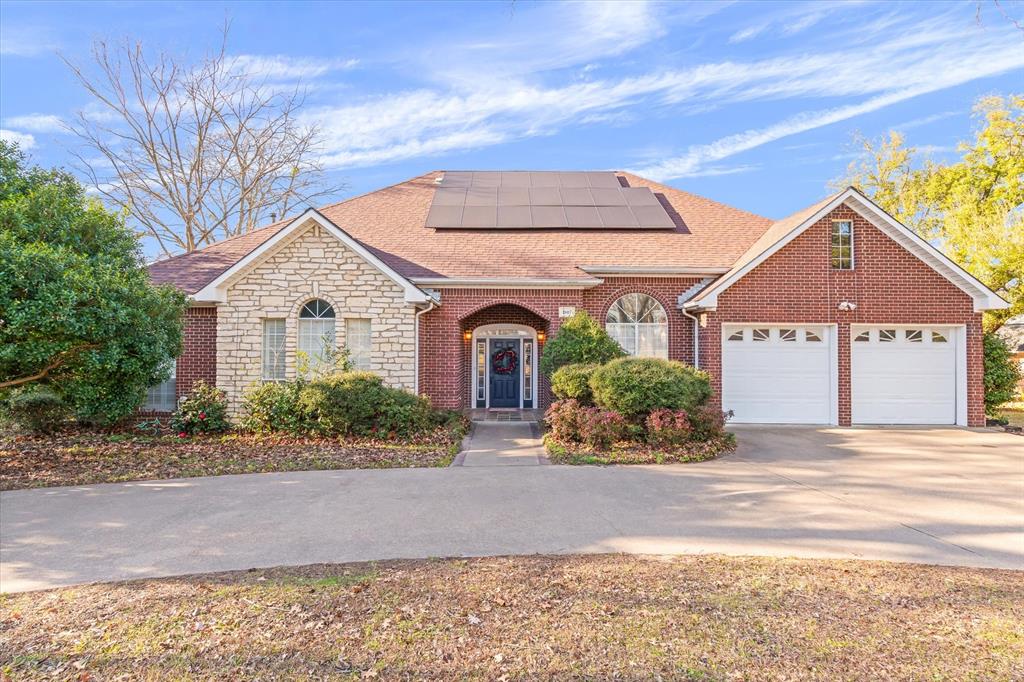 1807 Mill Creek Road Canton, TX 75103 - Photo 1 of 33 a front view of a house with a yard