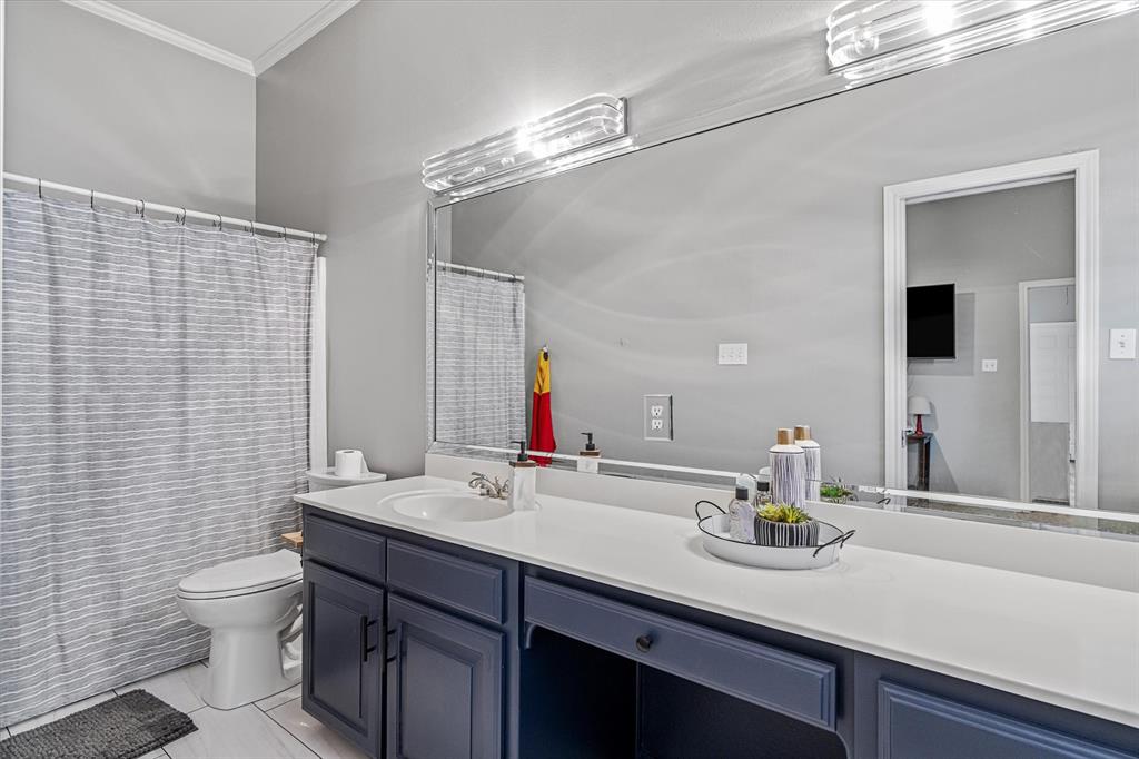 1807 Mill Creek Road Canton, TX 75103 - Photo 22 of 33 a bathroom with a sink and a mirror