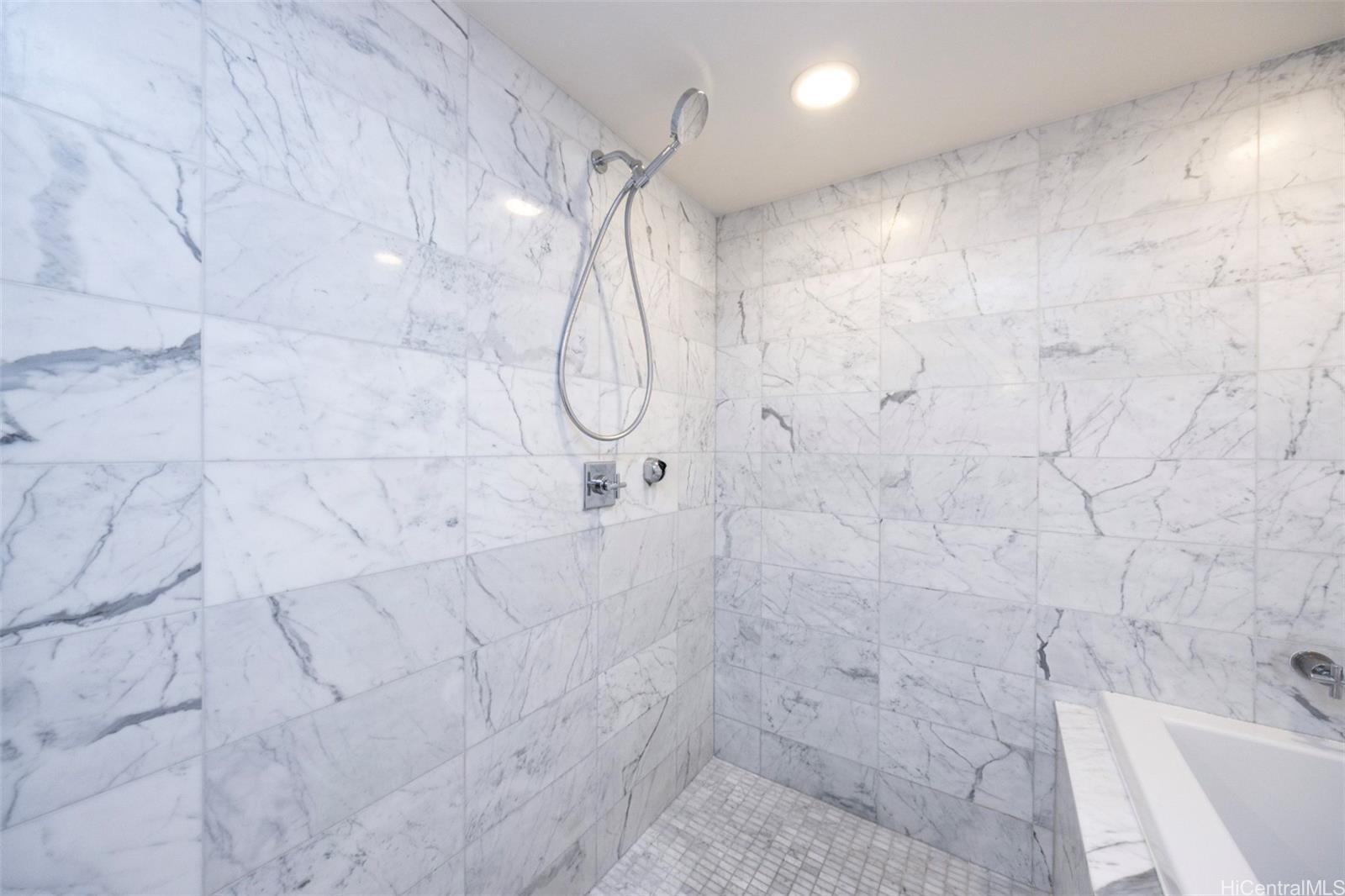 223 Saratoga Road, Unit 810 Honolulu, HI 96815 - Photo 14 of 24 a bathroom with a shower